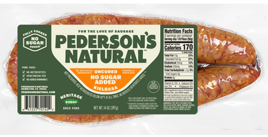 Pederson's Natural No Sugar Uncured Kielbasa in a clear plastic vacuum-sealed package with a green and white label.