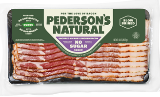 A package of Pederson's Natural Uncured Hickory Smoked Bacon, showing multiple slices of raw bacon in a clear plastic packaging with a green and white label.