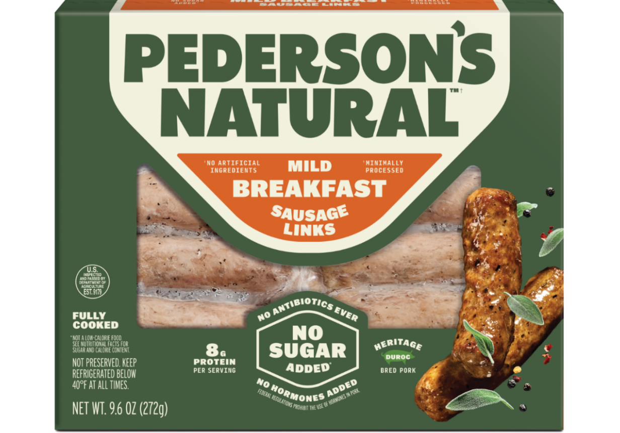 A box of Pederson's Natural Mild Breakfast Sausage Links on a plain background. The packaging is dark green and cream with orange accents, showing a clear window with the links inside and an illustration of cooked sausage links with herbs on the front.