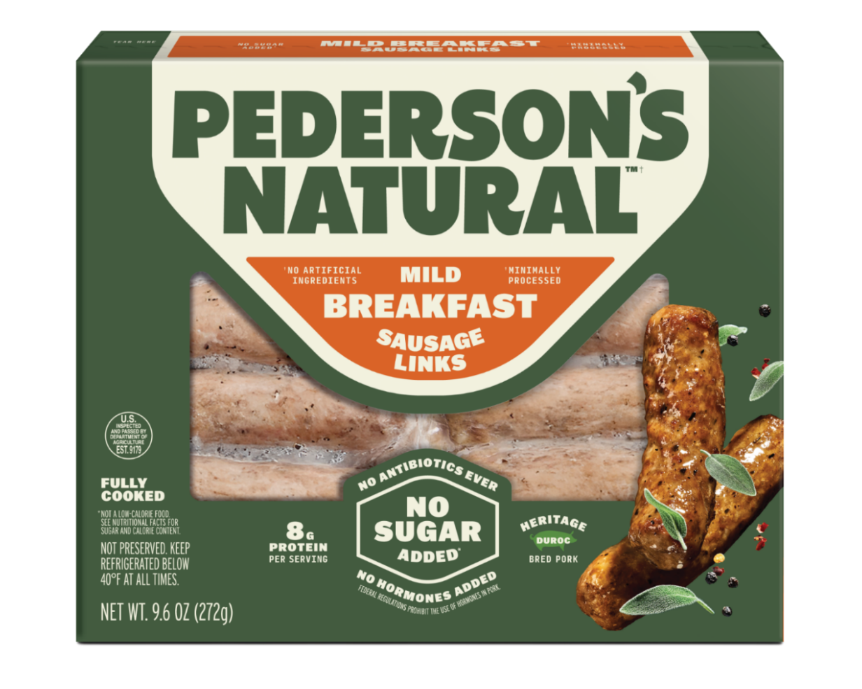 A box of Pederson's Natural Mild Breakfast Sausage Links on a plain background. The packaging is dark green and cream with orange accents, showing a clear window with the links inside and an illustration of cooked sausage links with herbs on the front.