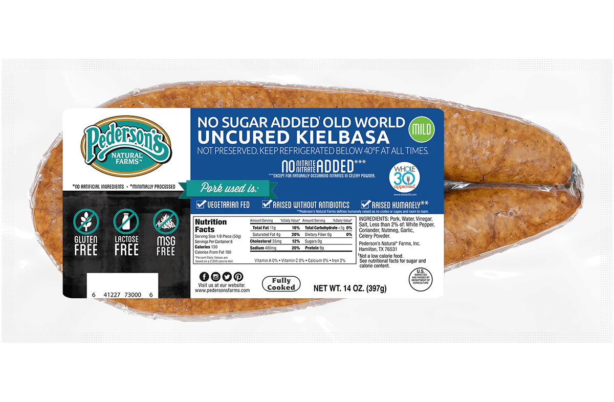 A package of No Sugar Added Old World Uncured Kielbasa, label includes product details, nutrition facts, and certification icons on a white background.